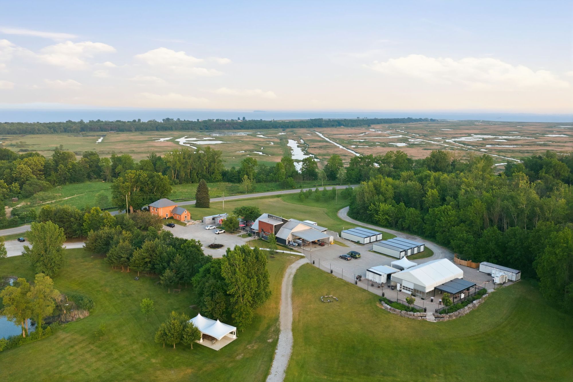 The estate from above: the guest house, the winery, the event space and the marsh