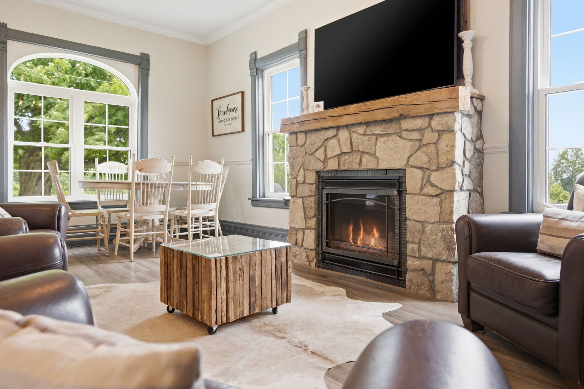 The guest house living room and its stone fireplace